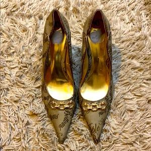 Gold Apple Bottoms Pumps